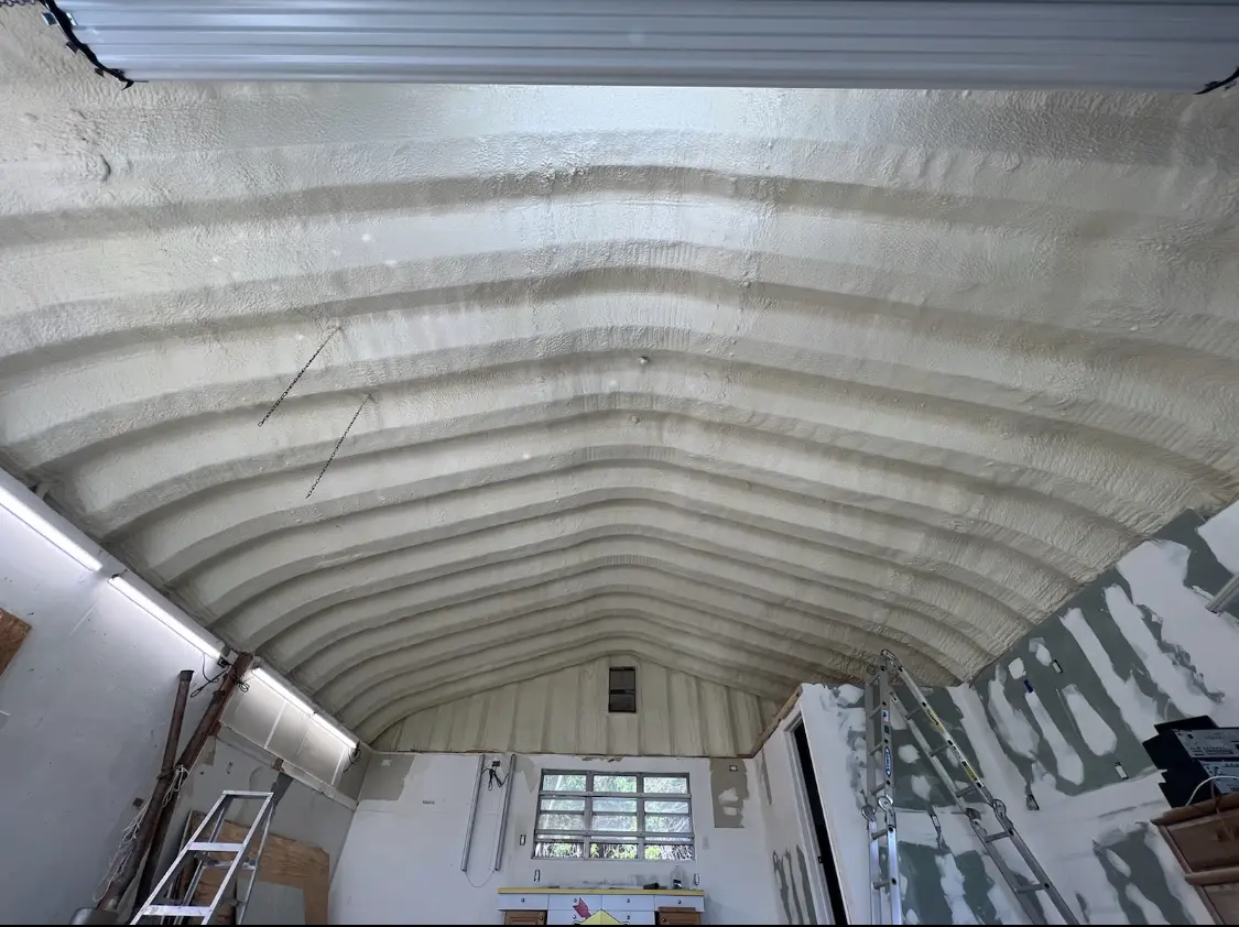 Spray polyurethane foam applied to the underside of a metal roof deck in South Heidelberg
